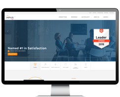 Desktop computer showing Paylocity's old website homepage