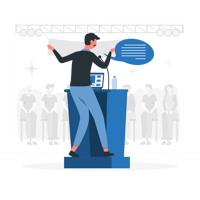 person on podium talking to crowd